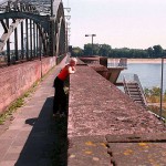 On a railway bidge and the riverside under it