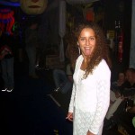 At a public party in a disco