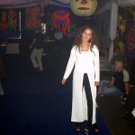 At a public party in a disco