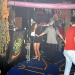 At a public party in a disco