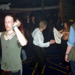 At a public party in a disco