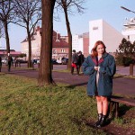 On a green area next to the river bank