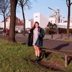 On a green area next to the river bank