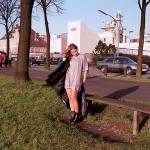 On a green area next to the river bank