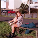 On a green area next to the river bank