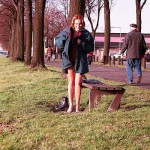 On a green area next to the river bank