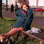 On a green area next to the river bank