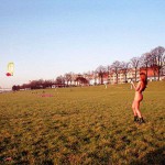 On a green area next to the river bank