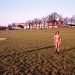 On a green area next to the river bank