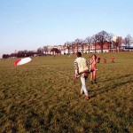 On a green area next to the river bank