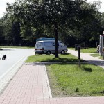 At a highway parking and in a park