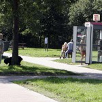 At a highway parking and in a park