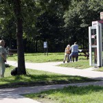 At a highway parking and in a park