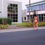 On a parking lot and a commercial area