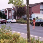 On a parking lot and a commercial area