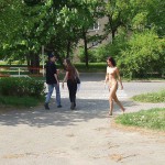 A fruit stand at a well frequented crossing