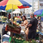 A fruit stand at a well frequented crossing