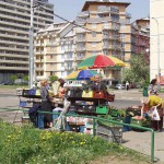 A fruit stand at a well frequented crossing