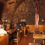 Fight of the knights in a cellar restaurant