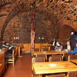 Fight of the knights in a cellar restaurant