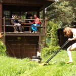 At a holiday home and in a bar with some friends