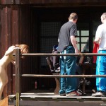 At a holiday home and in a bar with some friends