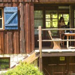 At a holiday home and in a bar with some friends