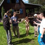 At a holiday home and in a bar with some friends