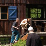 At a holiday home and in a bar with some friends