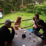 At a holiday home and in a bar with some friends