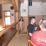 At a holiday home and in a bar with some friends