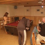 At a holiday home and in a bar with some friends