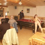 At a holiday home and in a bar with some friends