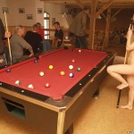 At a holiday home and in a bar with some friends