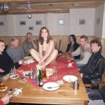 At a holiday home and in a bar with some friends