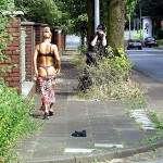 Stripping while walking on a street