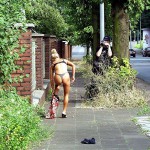 Stripping while walking on a street