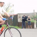 In front of and inside a car repair