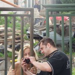 In front of and inside a car repair