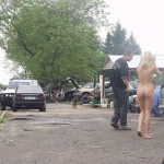 In front of and inside a car repair