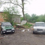 In front of and inside a car repair