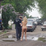 In front of and inside a car repair