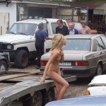 In front of and inside a car repair