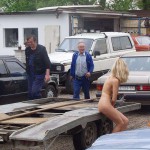 In front of and inside a car repair