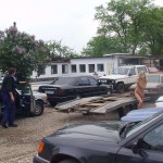 In front of and inside a car repair