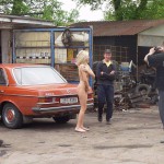 In front of and inside a car repair