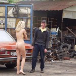 In front of and inside a car repair