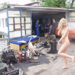 In front of and inside a car repair