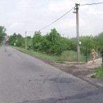 In front of and inside a car repair