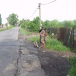 In front of and inside a car repair